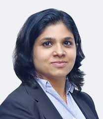 Dr. Swapna Athavale consulting with a patient