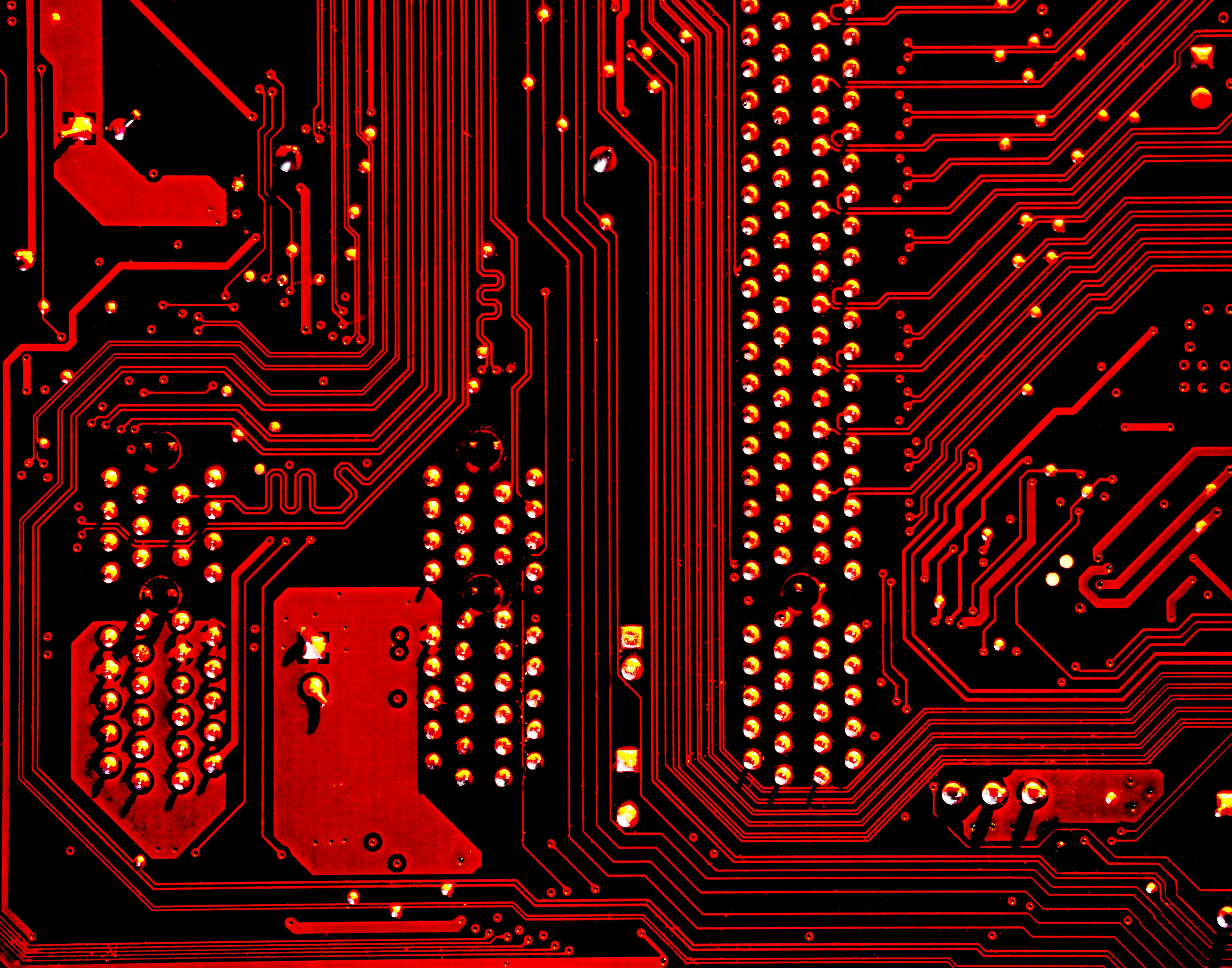 Close-up of a circuit board, representing hands-on technical work at Tricore